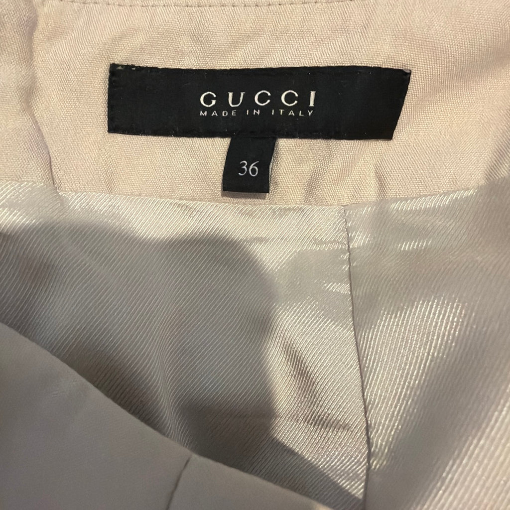 GUCCI BEIGE SKIRT WITH METAL LOGO