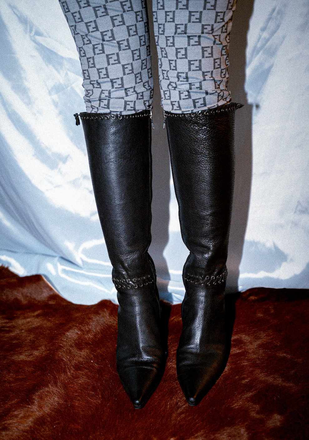 PRADA LEATHER BRAIDED BOOTS (SIZE 37)